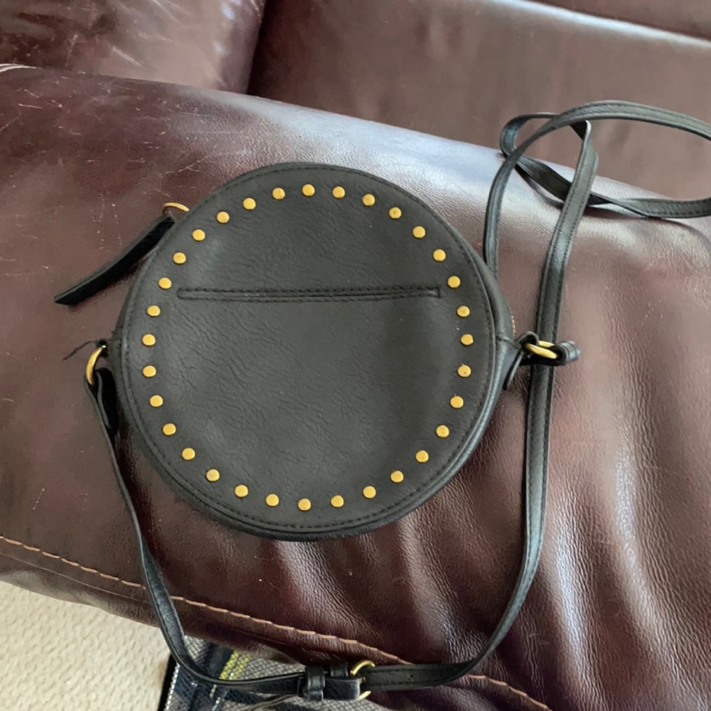 Circular crossbody bag.